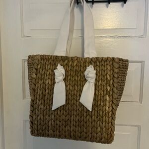 Elegant Tan Woven Tote with White Leather Handles